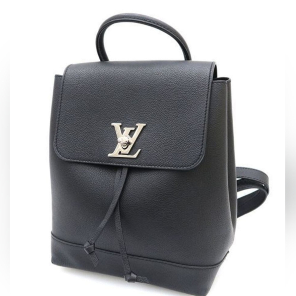 Louis Vuitton Lock Me Backpack W/ COA